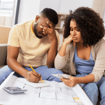 Man and partner stressed about money